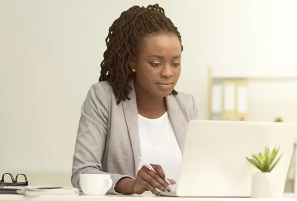 Business girl working on laptop