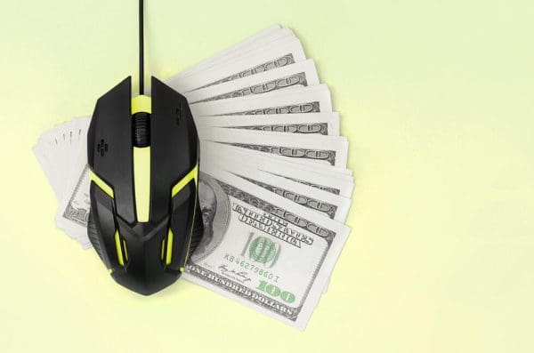 Black Computer Mouse On Many Hundred Dollar Bills Computer mouse on many dollar bills 980x649 1