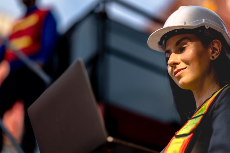 Construction-Engineer-Checking-Website-Results-Clients Construction engineer checking website results clients