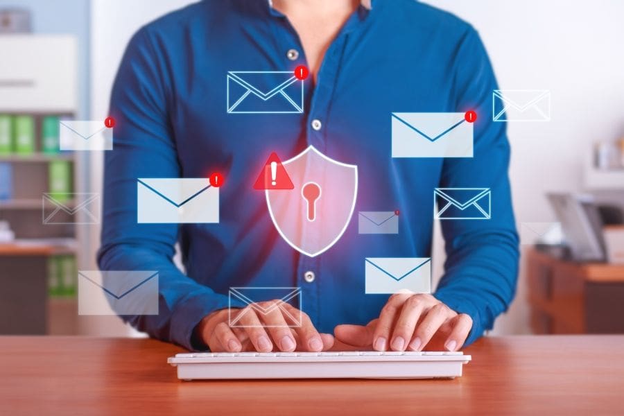 Person checking spam email and security
